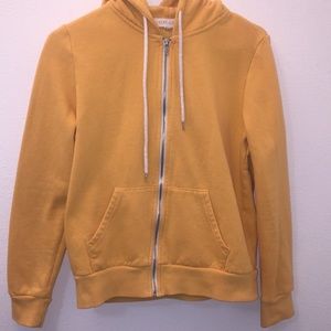 yellow zip up jacket